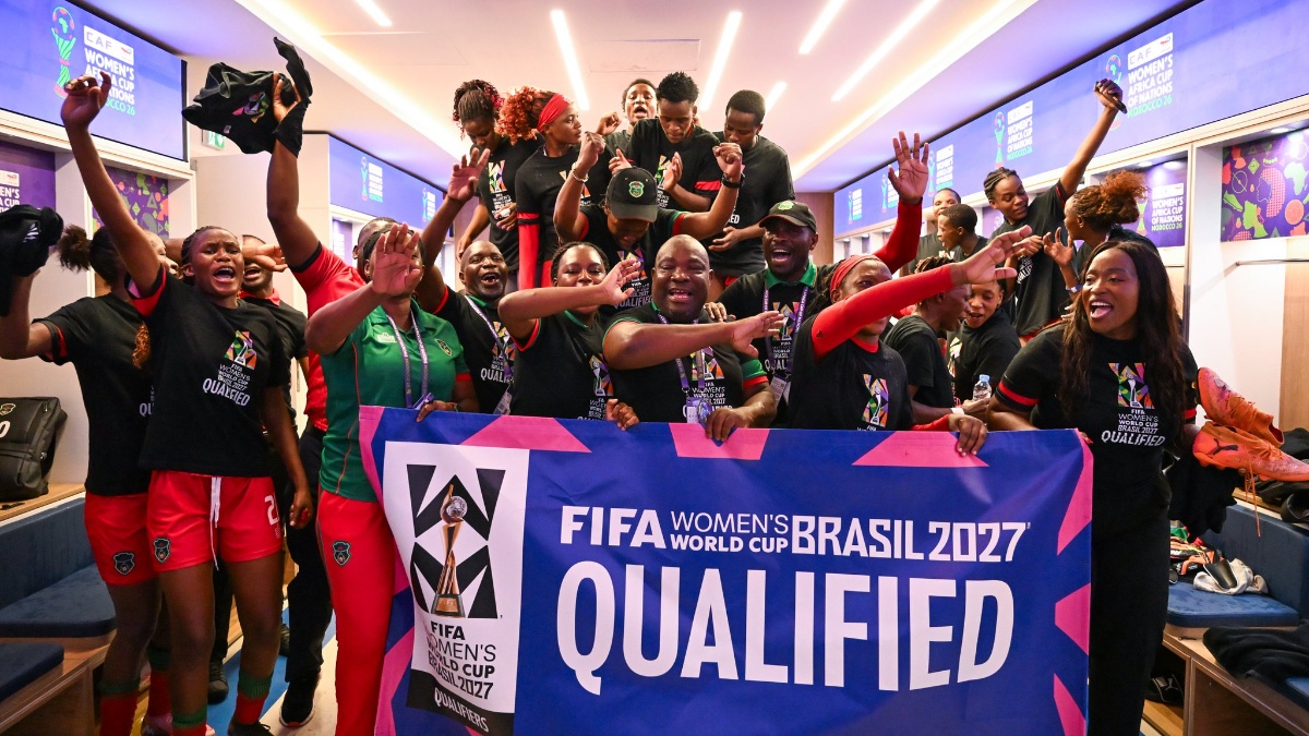 Malawi players and technical team celebrating after the match